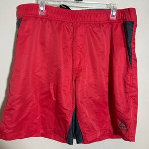 Men’s Reebok swimsuit. Size xl. Side and back Velcro pocket with mesh liner.